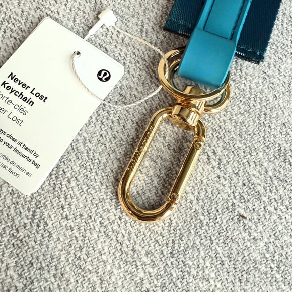 NEW Lululemon Never lost Keychain Wordmark Warp Teal Gold Blue - Picture 3 of 9